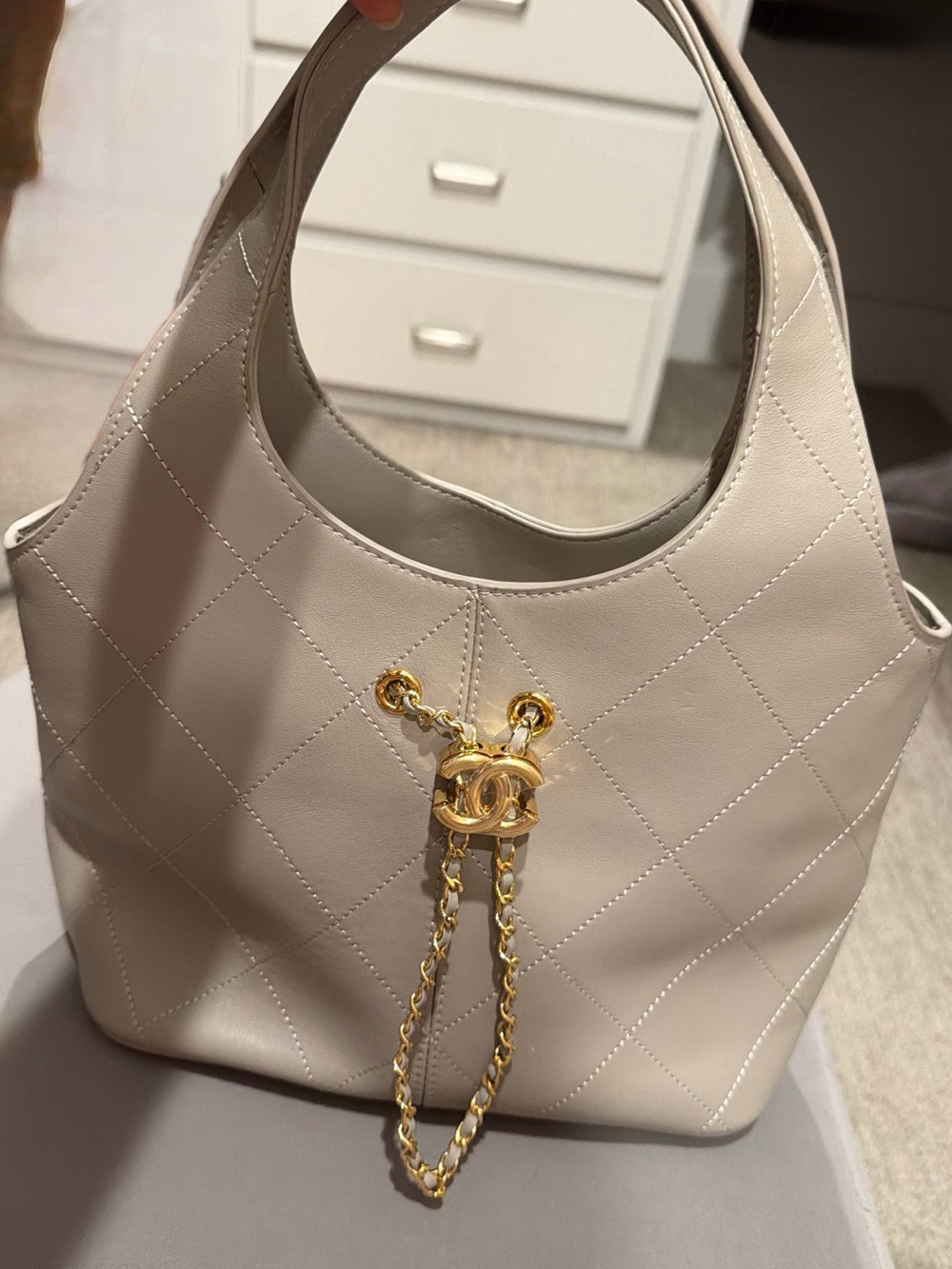 Quilted Taupe Hobo with Gold Chain Accents very unique and sleek